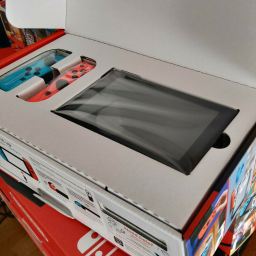 Nintendo Switch 32GB Console with Neon Blue and Neon Red Joy-Con