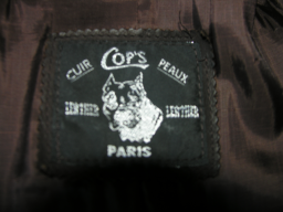 Cache poussière en cuir