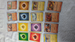 14 cartes Pokémon américaines originales neuves en étuis en nylon