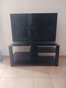 Meuble TV design en verre trempé noir, style contemporain asymétrique